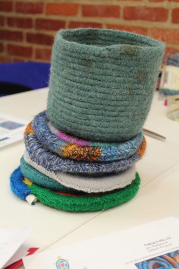 Stained Glass Rug Motifs, all stacked up with a padded crochet basket on top!