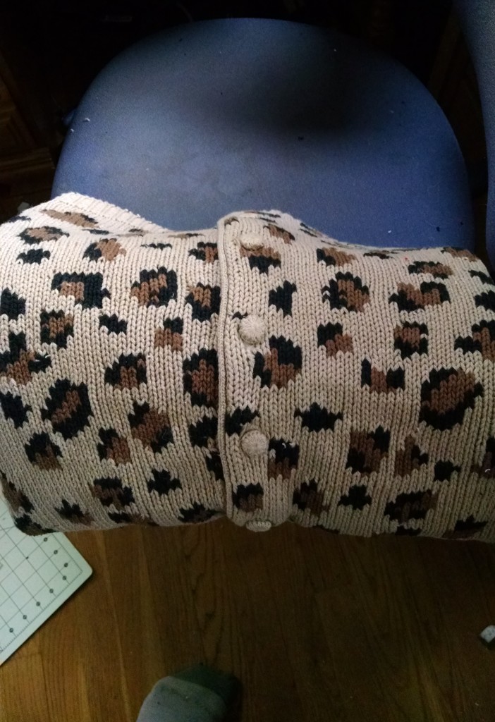 I cut pieces to preserve the button bands, then had to make sure the button bands were in the center of the pillow