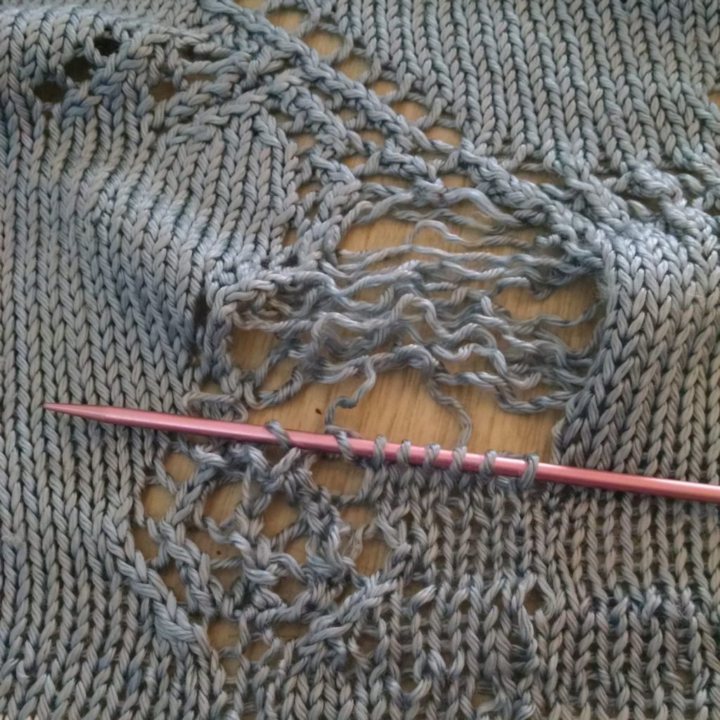 reknitting and reweaving the leg of the lace knit hobbyhorse