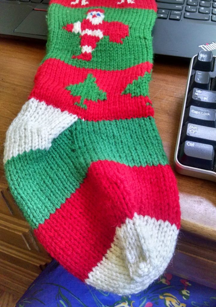 repaired christmas stocking ready to go back to its owners